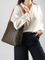 Schoudertas Second Life Louis vuitton Bruin second life LM1021-vue-porte
